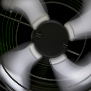 A close-up of a computer fan spinning rapidly.